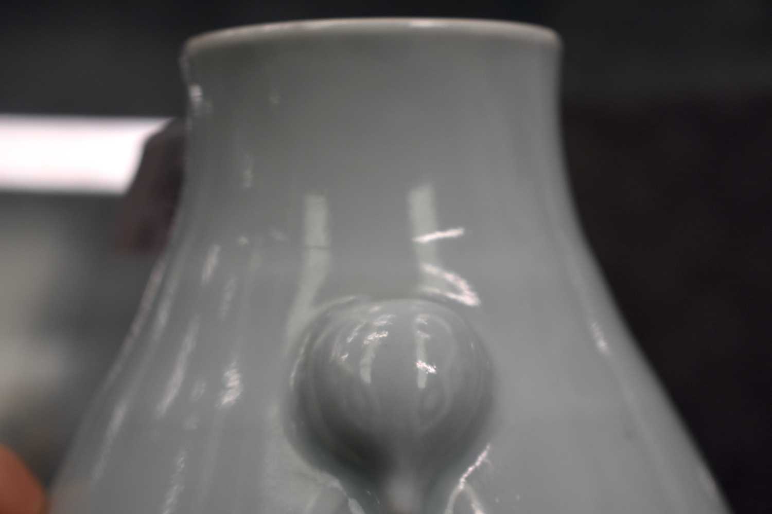 A CHINESE QING DYNASTY PALE CELADON GLAZED PORCELAIN HU VASE bearing Zhengde marks to base. 15.5 - Image 21 of 21