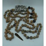 A collection of Central Asian Terracotta beads together with other beads (Qty)