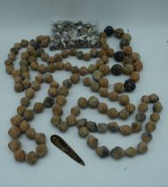 A collection of Central Asian Terracotta beads together with other beads (Qty)