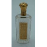 A 14CT GOLD AND GLASS SCENT BOTTLE. 49 grams. 8.75 cm x 2.75 cm.