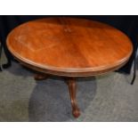 An early 20th Century Mahogany tilt top breakfast table on casters 76 x 118 cm.