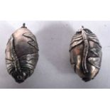 Two White Metal Egg Pendants. 4.5 cm x 2.6 cm, total weight 30.9g (2)