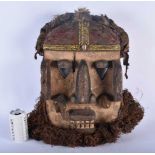 A LARGE AFRICAN TRIBAL CARVED WOOD MASK. 54 cm x 28 cm.