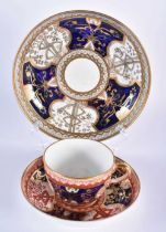 Spode teacup and saucer painted with the “Dollar” pattern and a saucer dish in the same pattern