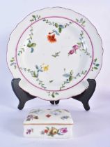18th century Meissen plate painted with swags of leaves and flowers under a puce line circle and