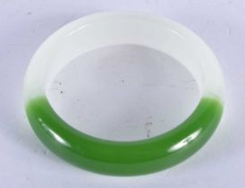 A CHINESE TWO TONE JADE BANGLE 20th Century. 59.4 grams. 6 cm wide.