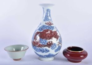 A CHINESE IRON RED BLUE AND WHITE PORCELAIN DRAGON VASE 20th Century, together with a bowl & brush