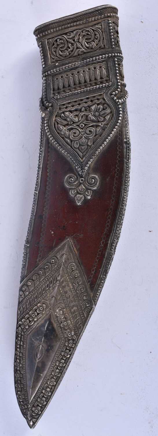 A 19TH CENTURY MIDDLE EASTERN INDIAN SILVER MOUNTED LEATHER CASED KNIFE. 35 cm long. - Image 6 of 7