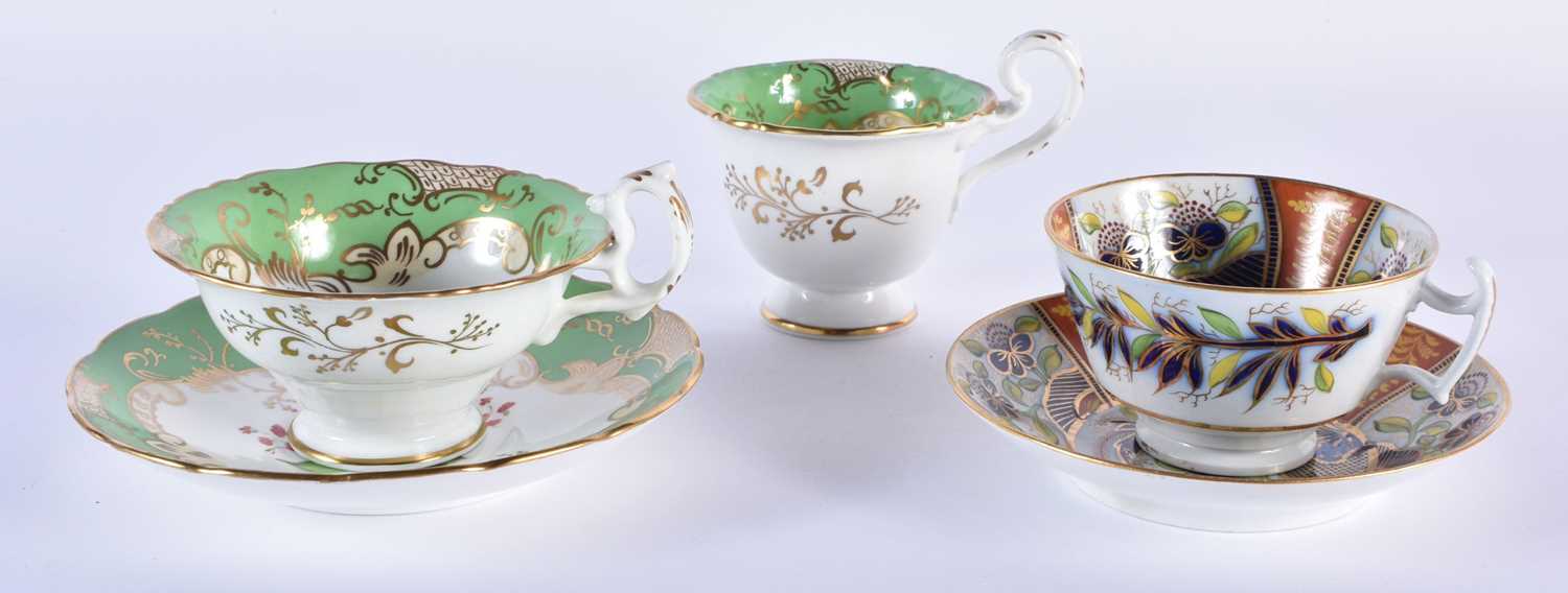 English fine cup and saucer, with coffee cup painted with large specimen flowers under a lime