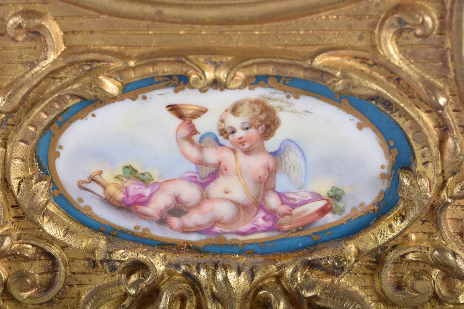 A 19TH CENTURY FRENCH ORMOLU AND SEVRES PORCELAIN MANTEL CLOCK supported upon a white marble base. - Image 3 of 7