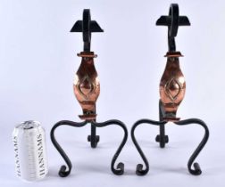 A PAIR OF ARTS AND CRAFTS COPPER AND WROUGHT IRON ANDIRONS decorated with a motif. 35 cm x 14 cm.