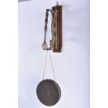 A RARE LATE VICTORIAN/EDWARDIAN BRONZE AND OAK MONKEY DINNER GONG. 55 cm x 15 cm.