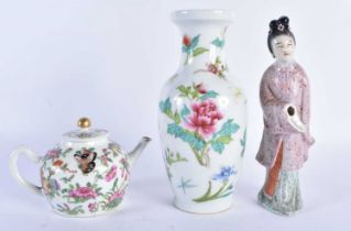 A 19TH CENTURY CHINESE CANTON FAMILLE ROSE TEAPOT AND COVER Qing, together with a famille rose
