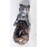 A Continental Quartz Egg Pendant Mounted with a Silver Dog with Gem Set Eyes. Stamped 84, 2.8 cm x 2