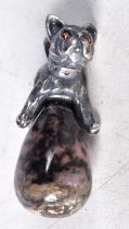 A Continental Quartz Egg Pendant Mounted with a Silver Dog with Gem Set Eyes. Stamped 84, 2.8 cm x 2