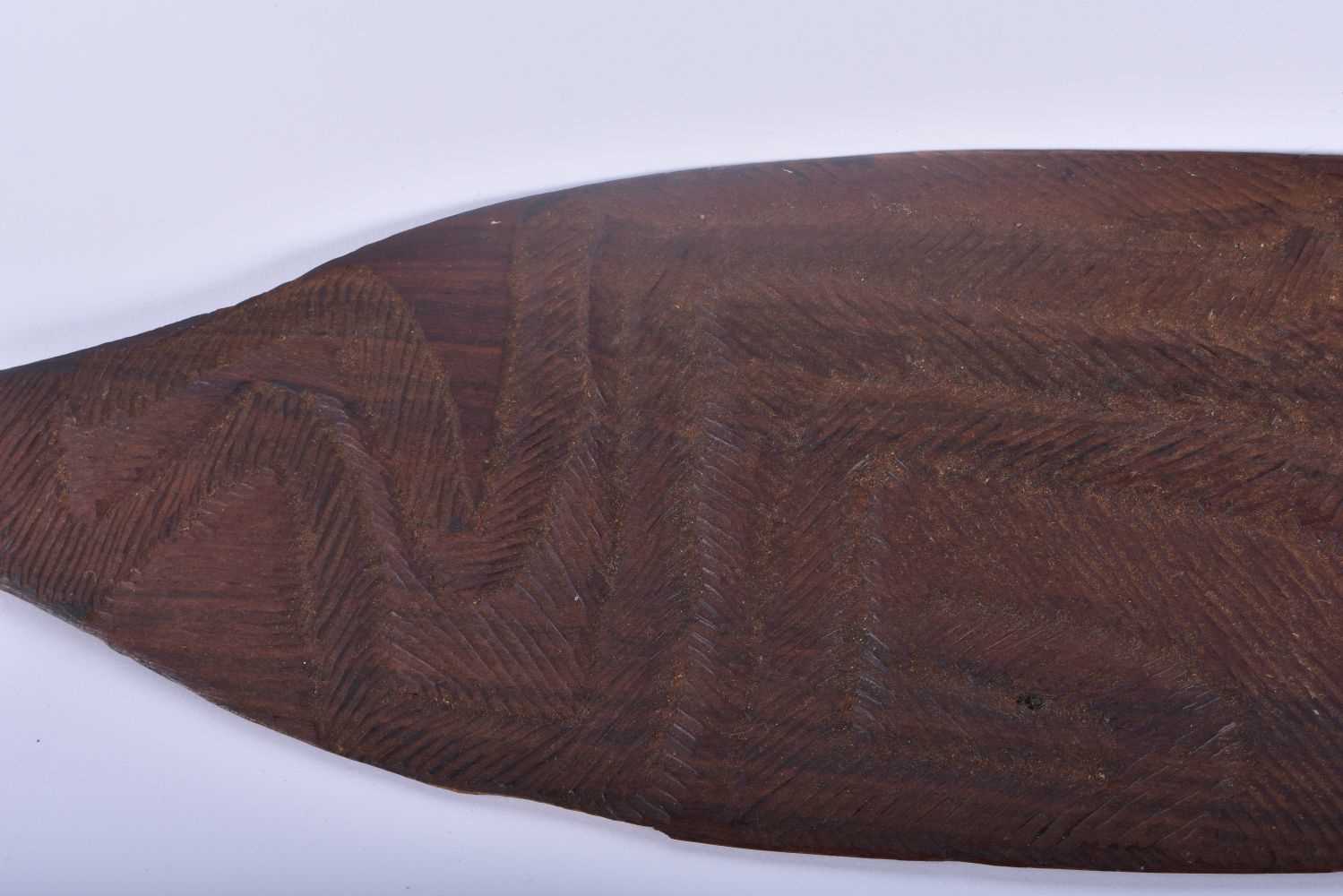 TWO ABORIGINAL TRIBAL CARVED WOOD SHORT PADDLES engraved with motifs. 70 cm long. (2) - Image 2 of 5