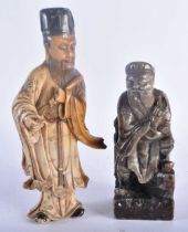 TWO 19TH CENTURY CHINESE CARVED SOAPSTONE FIGURES OF SCHOLARS Qing. Largest 22 cm high. (2)
