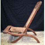 An Asian Burmese Anglo Indian carved wood folding chair 89 x 50 cm