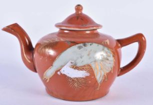 A CHINESE REPUBLICAN PERIOD CORAL GROUND PORCELAIN TEAPOT AND COVER. 14 cm wide.