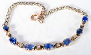 A Gold, Diamond and Sapphire Bracelet. 17cm long, weight 5.7g