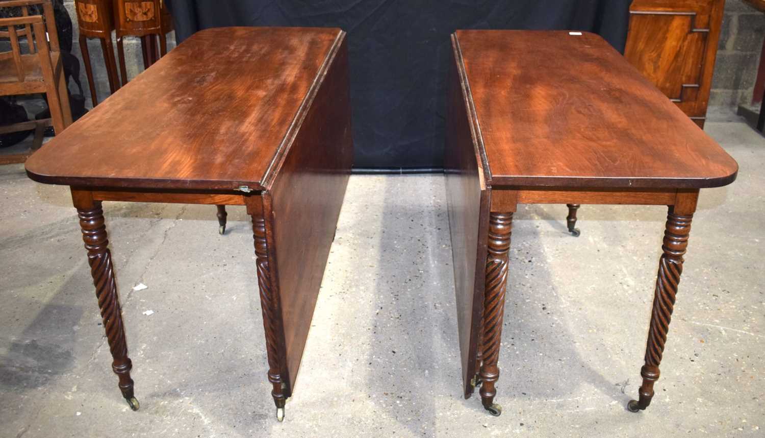 A large antique mahogany two section dining table with two folding centre legs 74 x 201 x 130 cm. - Image 8 of 14