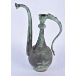 An Early Middle Eastern Copper Ewer. 35cm x 17cm