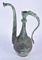 An Early Middle Eastern Copper Ewer. 35cm x 17cm