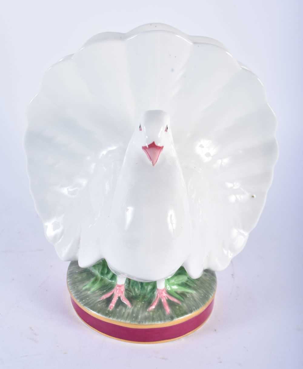 A CHARMING VICTORIAN PORCELAIN POSY HOLDER Attributed to Minton, formed as a fan tailed pigeon. 16