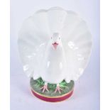 A CHARMING VICTORIAN PORCELAIN POSY HOLDER Attributed to Minton, formed as a fan tailed pigeon. 16