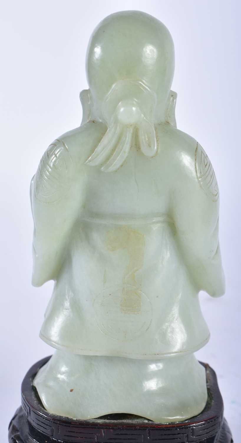 AN EARLY 20TH CENTURY CHINESE CARVED GREEN JADE FIGURE OF AN IMMORTAL Late Qing/Republic. 17 cm x - Image 4 of 5