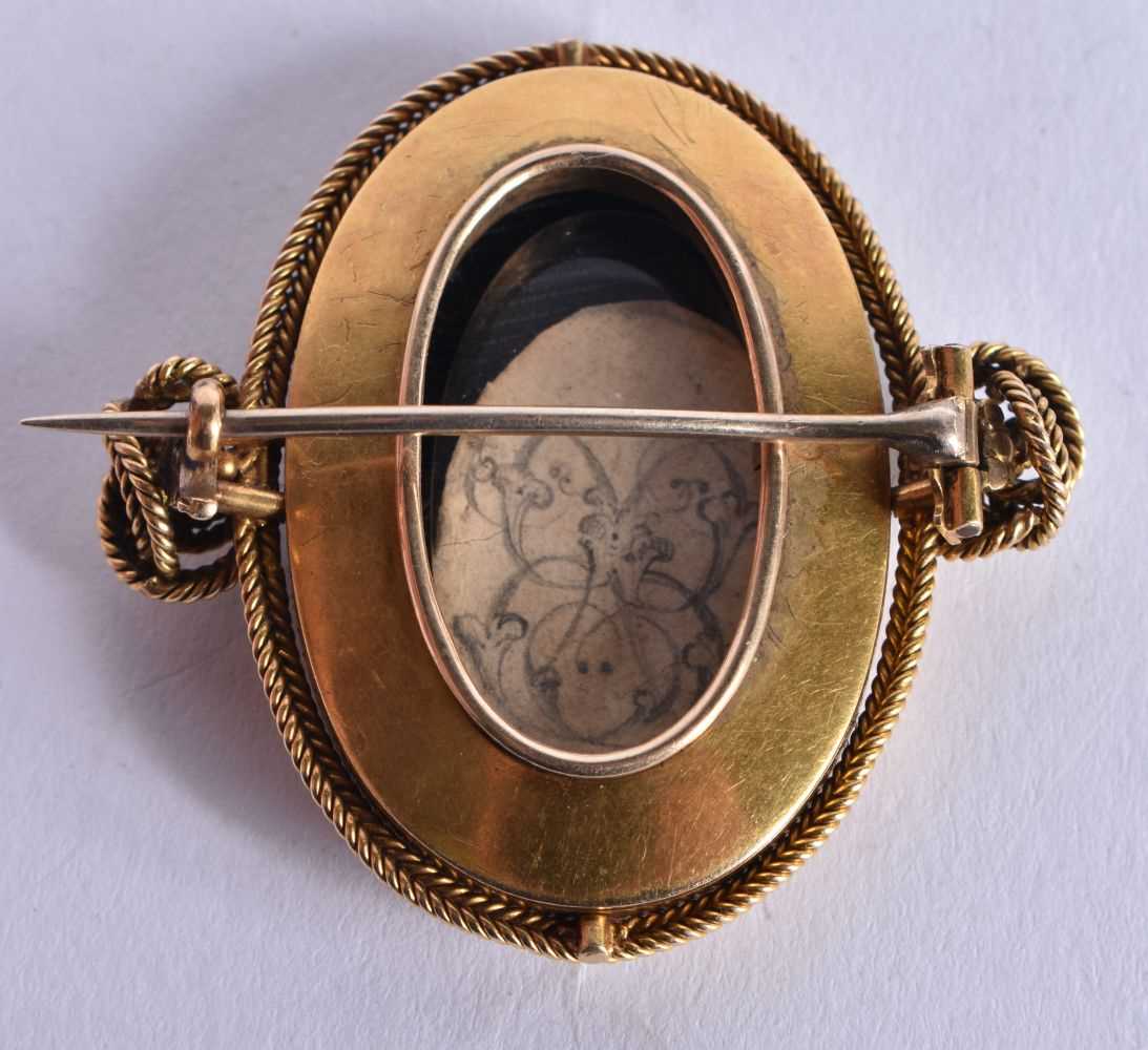 An Early 19th Century High Carat Gold and Enamel Brooch decorated with Cherubs. 4.4cm x 4.5 cm, - Image 2 of 3