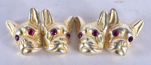 A Pair of Gold Dog Head Cufflinks with Gem Set Eyes. Stamped 84, 1.5 cm x 1.3 cm, weight 12.1g