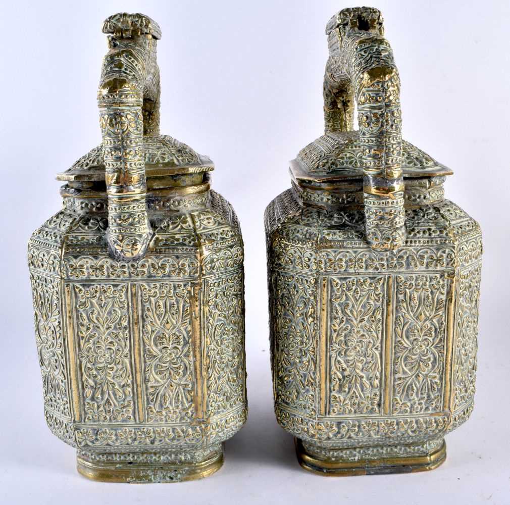 A LARGE PAIR OF 19TH CENTURY INDIAN BRONZE TEAPOTS AND COVERS decorated with floral sprays and - Image 4 of 6