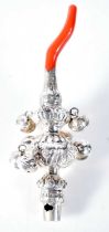A Silver Babies Rattle with Coral Teether. 13.8 cm x 5.1cm. weight 56g
