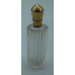 A 14CT GOLD AND GLASS SCENT BOTTLE. 43 grams. 8.75 cm x 2.75 cm.