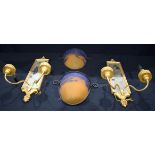 A pair of gilt wood mirrored wall sconces together with a pair of glass Muller Freres sconces