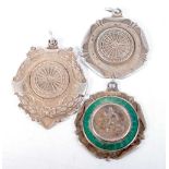 Three Sporting Medallions (Darts and Running). Largest 4.2 cm x 3.4cm (3)