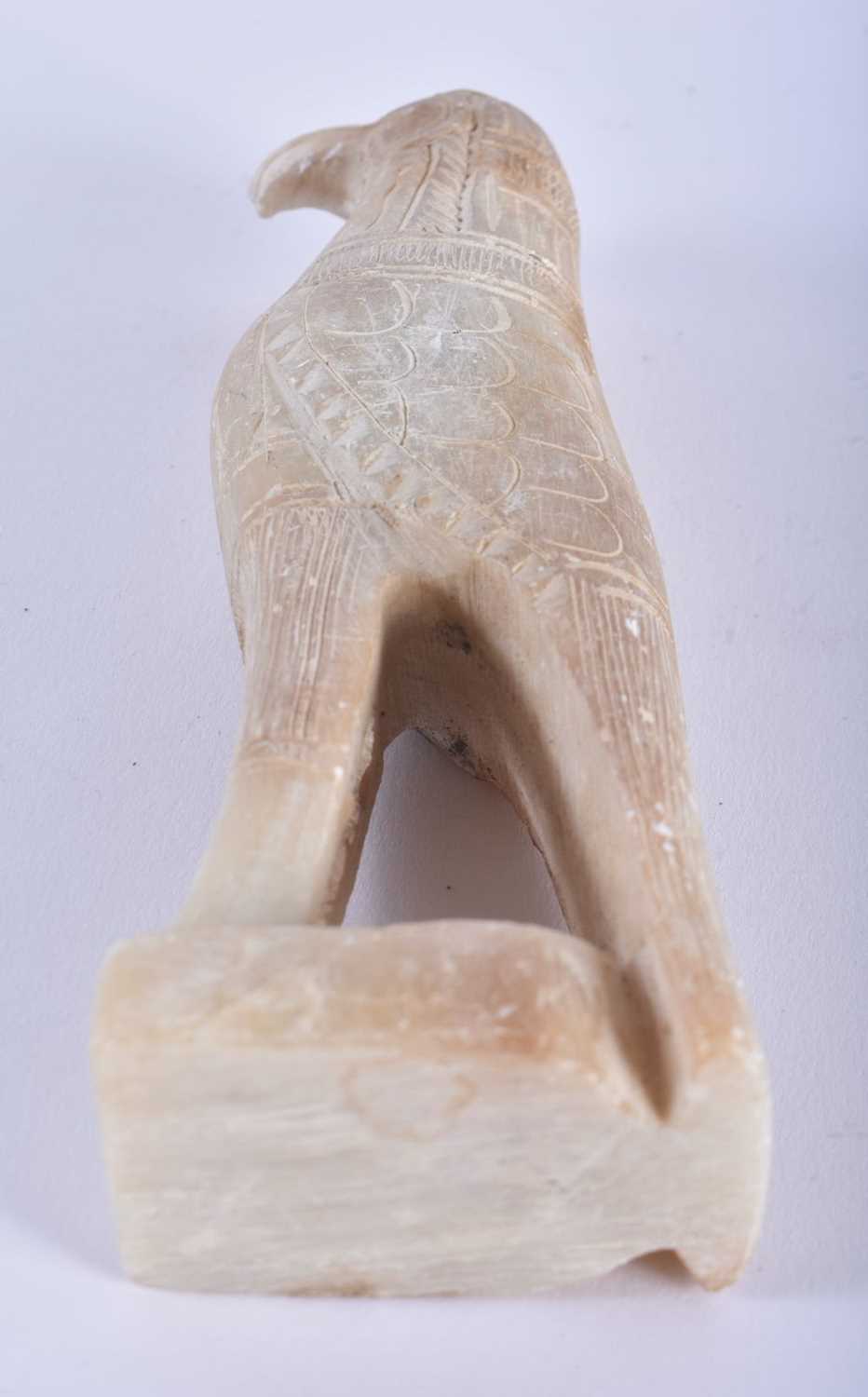 AN ANCIENT EGYPTIAN STYLE ALABASTER STATUE OF THE GODDESS HORUS. Possibly 664-332 BC. 15 cm high. - Image 4 of 4