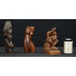 A carved Walnut figure of a female nude by John Fox together with two African Tribal carvings 21