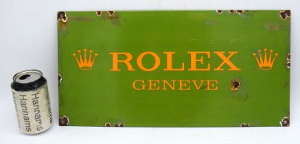A metal enamelled Rolex style sign 23 x 46 cm. .