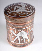 An Egyptian Copper Box and Cover with Silver Inlay figures. Engraved Cairo 1945. 10cm x 7.8 cm,