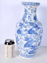 A Chinese porcelain blue and white vase decorated with fish and Algae 36 cm.