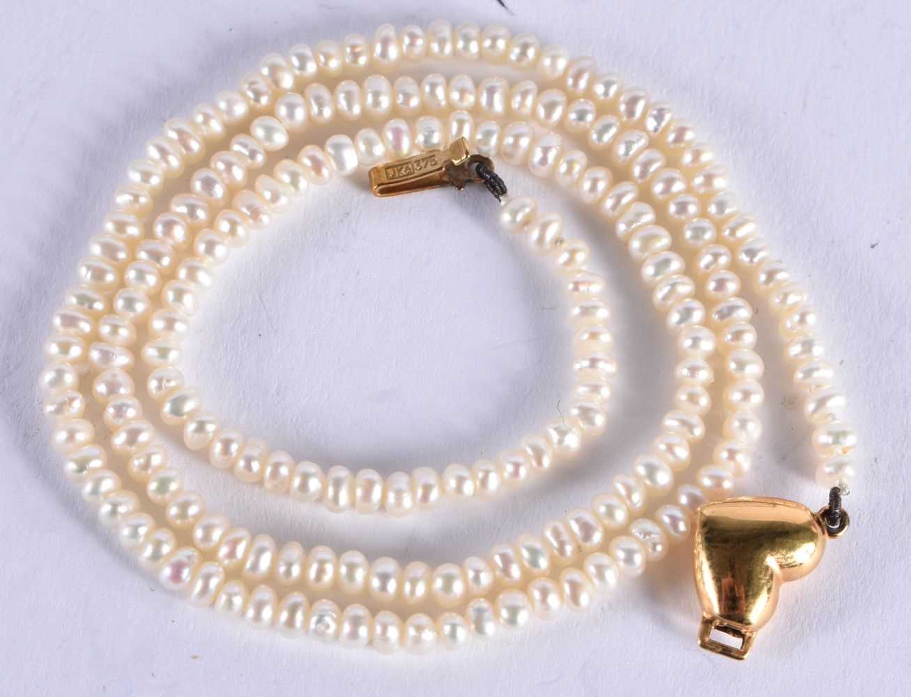 A 9CT GOLD MOUNTED PEARL NECKLACE. 6 grams. 41 cm long. - Image 2 of 4