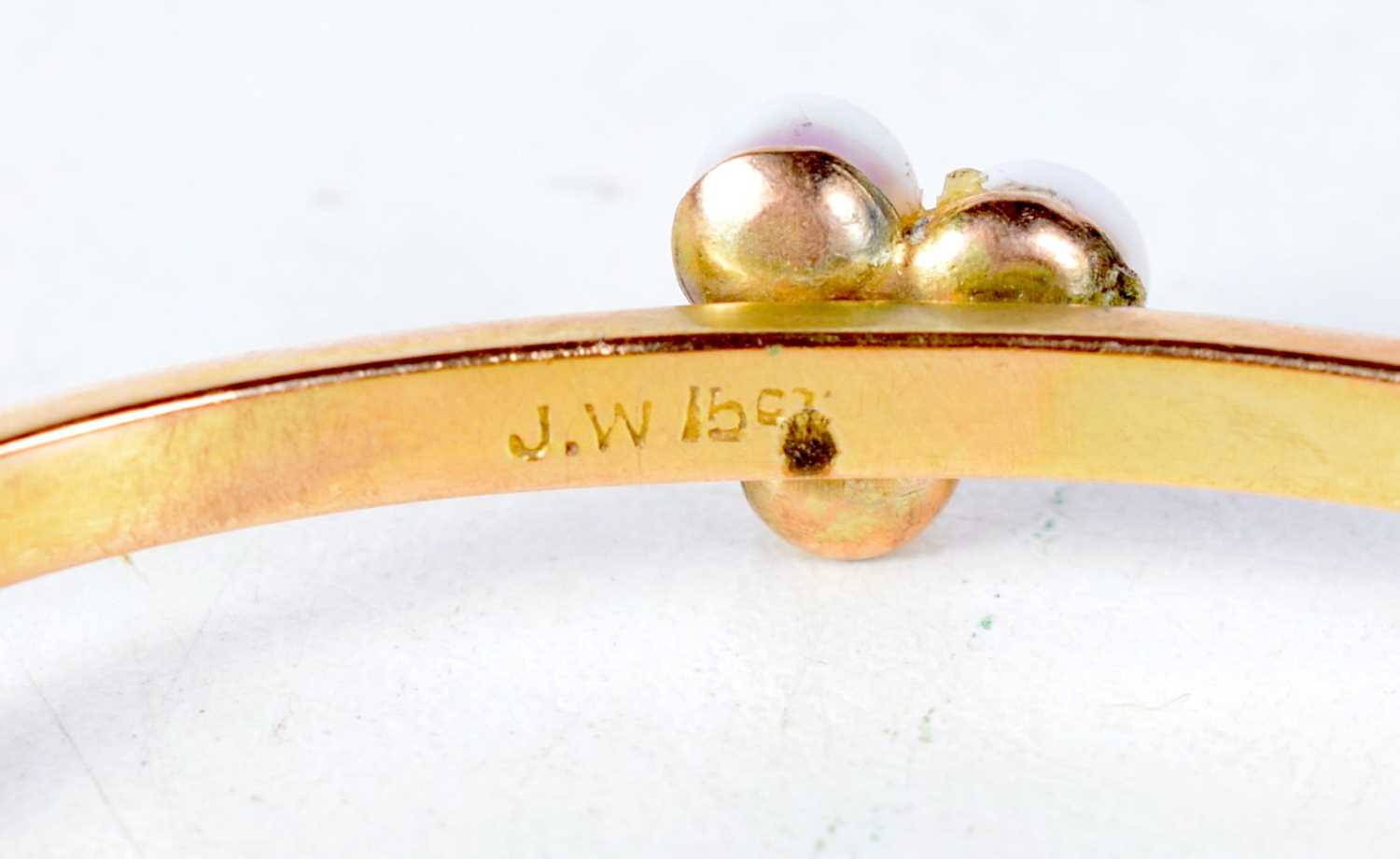 An Antique 15 Carat Gold Bangle set with 3 Pearls. Stamped 15CT, 4.8 cm x 5.7cm, weight 6.6g - Image 2 of 3
