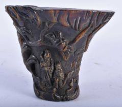 A CHINESE CARVED BUFFALO HORN TYPE LIBATION CUP 20th Century. 626 grams. 13 cm x 13 cm.