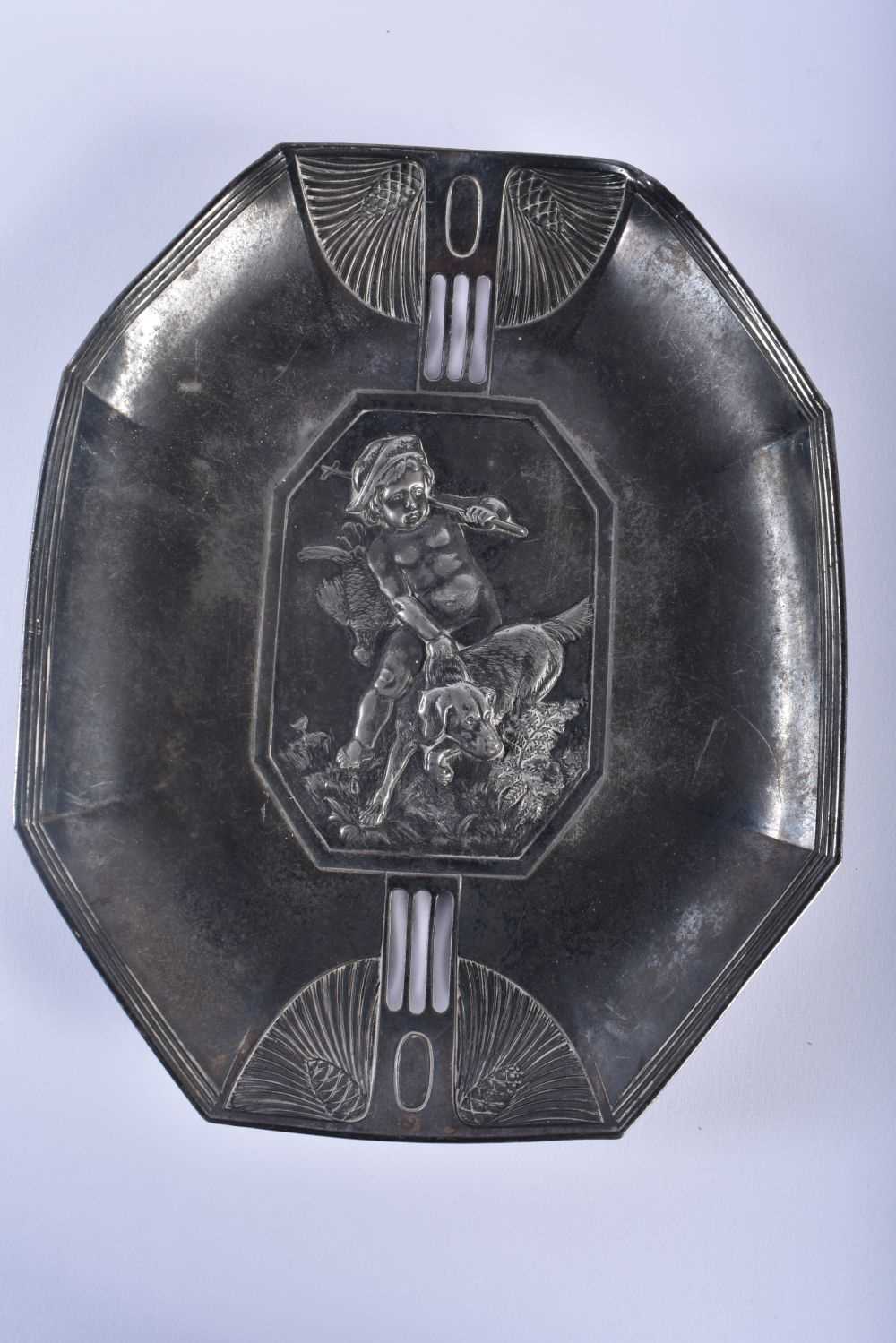 A SECESSIONIST MOVEMENT PEWTER PUTTI AND HOUND DISH possibly by WMF, decorated with wings. 25cm x 20