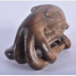 A Japanese Hardwood Netsuke carved as an Octopus. 5 cm x 3.2 cm x 2.9cm, weight 19.6g