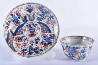 A 17TH/18TH CENTURY CHINESE BLUE AND WHITE IMARI PORCELAIN TEABOWL AND SAUCER Kangxi/Yongzheng. 10.5