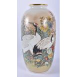 A LATE 19TH CENTURY JAPANESE MEIJI PERIOD KUTANI PORCELAIN VASE by Taniguchi, painted with birds