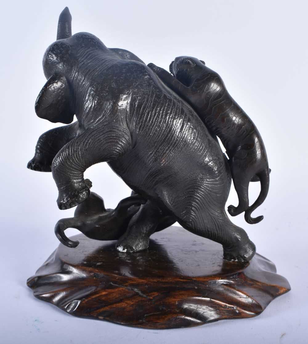 A 19TH CENTURY JAPANESE MEIJI PERIOD BRONZE OKIMONO modelled as an elephant being attacked by - Image 5 of 8